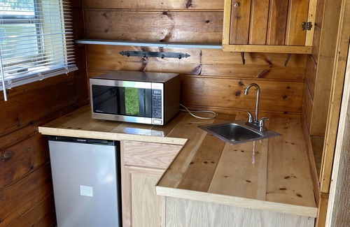Indian River Cottage | Cozy Lakeside Cabin with Beach