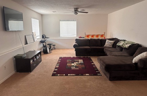 Los Lunas House | Cozy large home with. Downstairs with a closed door will be the rented space