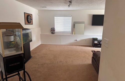 Los Lunas House | Cozy large home with. Downstairs with a closed door will be the rented space