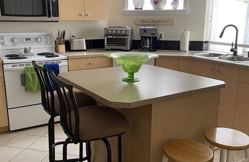 Langley Apartment | Cozy like home Rural feel in urban area central to sightseeing . Close to shops