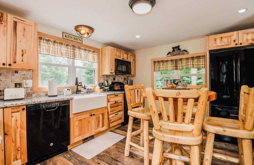 East Jordan House | Cozy Lil Red Cabin; Water Frontage, Dog Friendly!