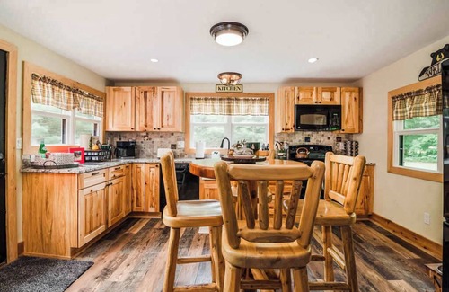 East Jordan House | Cozy Lil Red Cabin; Water Frontage, Dog Friendly!