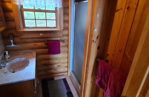 West Bay House | Cozy log cabin with fantastic views and 2 bathrooms
