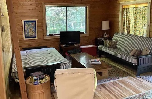 Gould City House | Cozy LOG CABIN in the woods