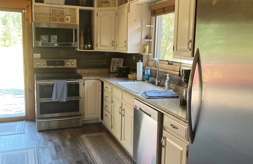 Kicking Horse Cabin | Cozy log cabin on 20 private acres