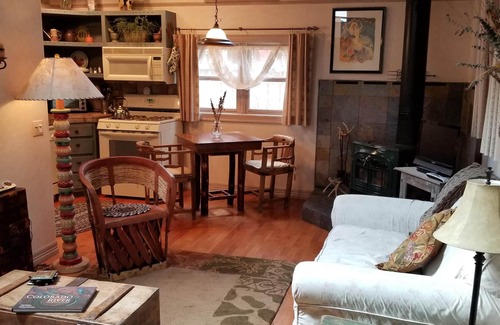 Redstone Cabin | Cozy Log Cabin w/Hot Tub on Redstone Blvd, beautifully landscaped for privacy.