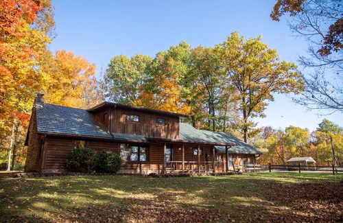 Dola Cabin | Cozy log cabin with pond nestled within 10 wooded acres. Accommodates up to 12!