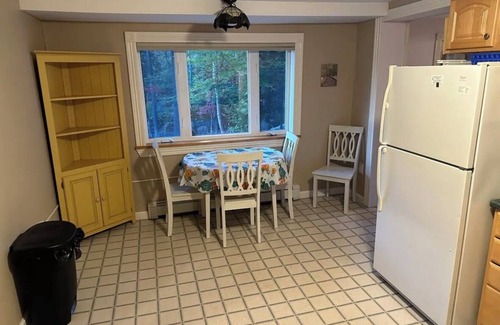 Lucerne-in-Maine Cabin | Cozy Log Home across from Phillips Lake-Four Season Fun