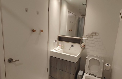 Chaplin Estates Apartment | Cozy Midtown Condo Steps to Subway & Amenities