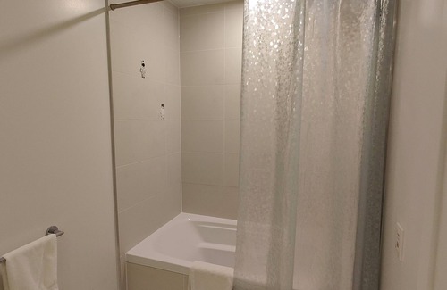 Chaplin Estates Apartment | Cozy Midtown Condo Steps to Subway & Amenities