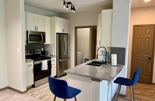 South Main Apartment | Cozy Modern Apartment with patio and pool.