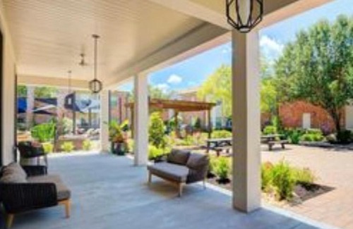 South Main Apartment | Cozy Modern Apartment with patio and pool.