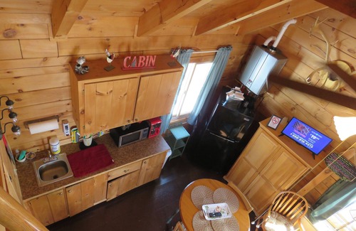 East Corinth Cabin | Cozy modern cabin located on large parcel one mile off the main road.