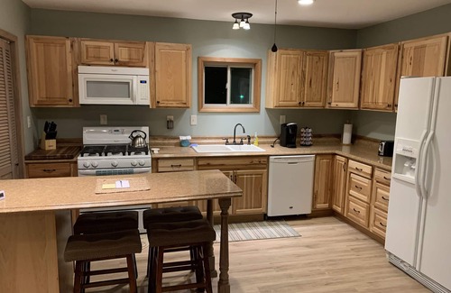 Petoskey Apartment | Cozy Modern Carriage Apartment Close to Shopping Sports Golf & Skiing