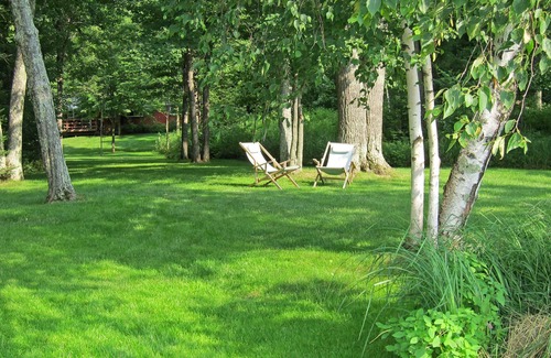Minocqua Cottage | Cozy modern cottage. Lovely grounds. Private dock. Lake Shishebogama!