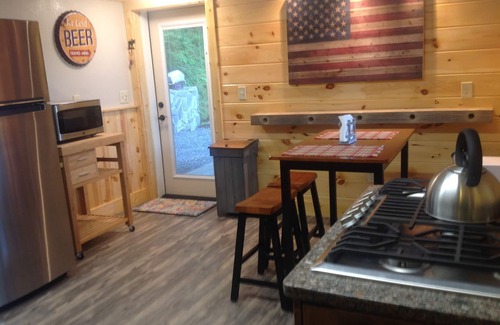 Cranberry Falls Cabin | Cozy mountain retreat overlooking long-range mountain views.