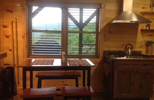 Cranberry Falls Cabin | Cozy mountain retreat overlooking long-range mountain views.