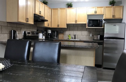 East Kootenay Condo | Cozy Mountain retreat backing onto Toby Creek