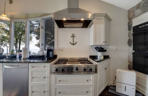 Mullett Lake Cottage | Cozy Mullett Lake Paradise- Lakefront property with Year-Round Recreation!