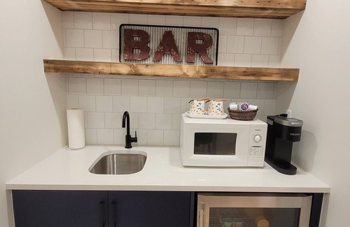 Southeast Calgary House | Cozy new unit near restaurants, bars, stores, bus stations, and hospital.