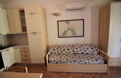 Porto Pollo Apartment | Cozy one-bedroom apartment in Porto Pollo "Il Borgo" 300 m from the beach