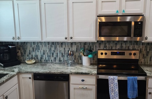 Corpus Christi House | Cozy One-Bedroom Townhome steps from the beach Wifi, heated pool!Coastal retreat