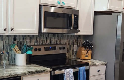 Corpus Christi House | Cozy One-Bedroom Townhome steps from the beach Wifi, heated pool!Coastal retreat