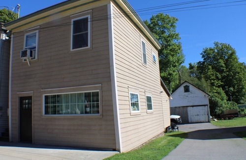 Bloomville House | Cozy one bedroom unit filled with natural daylight and lovely Mountain Views.