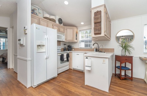 Nokomis House | Cozy park home amenities galore! Near Legacy Bike trail & only 3 miles to beach.