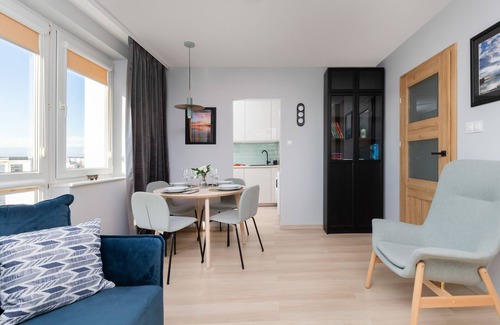 Emaus Apartment | Cozy Pastel Studio in Gdańsk by Renters