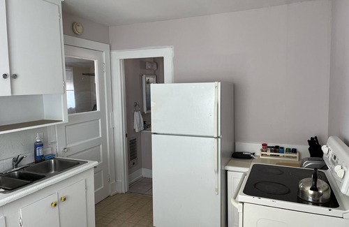 South End Cottage | Cozy pet friendly cottage nestled a quiet backyard.