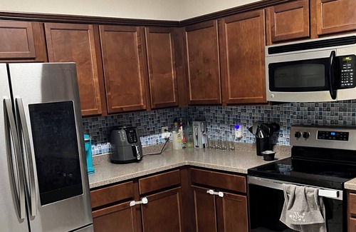 Baymeadows Condo | Cozy private bedroom with lock on bedroom door.