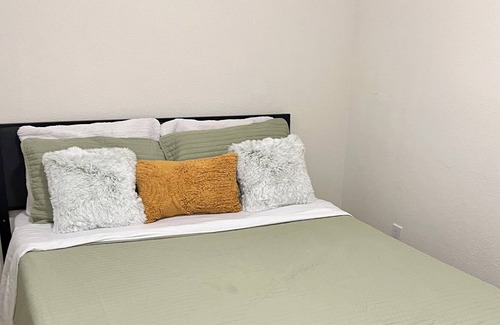 Baymeadows Condo | Cozy private bedroom with lock on bedroom door.