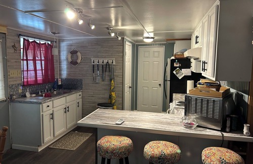 Florien Cabin | Cozy, private, rustic-modern cabin, a doorway to fine fishing and lake fun!