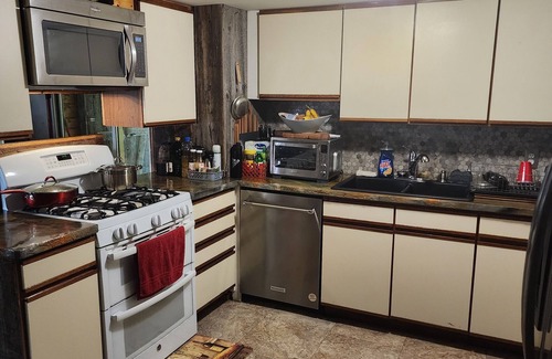 Penobscot County House | Cozy quiet house with rustic vibe. Bedroom with private bathroom for guest use