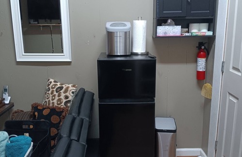 Red Rock Cabin | Cozy Ranch Cottage, Red Rock, Texas. One bedroom with in suite bathroom.