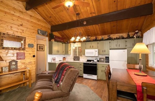Sugarloaf House | Cozy Red Cabin - Hot Tub, Fenced Yard, Walk to Park