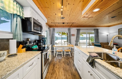Traverse City Cottage | Cozy remodeled cottage directly on Bass Lake. Ten minutes to Traverse City.
