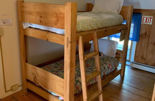 Rowe Bed & Breakfast | Cozy Retreat in Historic Farmhouse, Charming Bunk Bed Room,- Owl Dorm