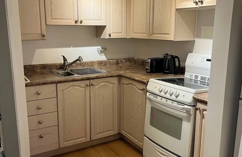 The Beaches Apartment | Cozy retreat steps from the beach, boardwalk, and trendy Queen St shops!