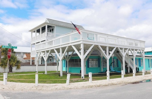 Bel Air House | Cozy Retreat , steps to the beach, heated pool , gulf views & huge party Deck