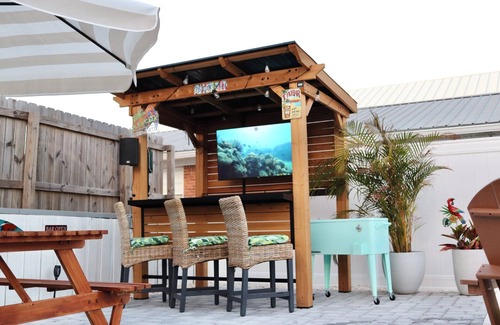Bel Air House | Cozy Retreat , steps to the beach, heated pool , gulf views & huge party Deck