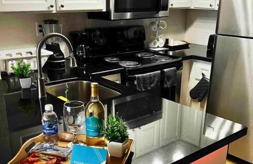 South Miami Apartment | Cozy retreat with pool, grill, hot tub, gym, pet friendly and free parking,