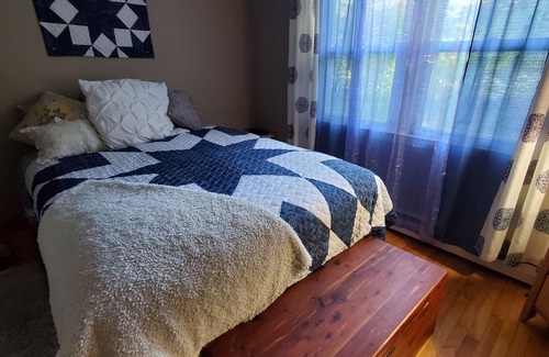 Litchfield House | Cozy room inside a country cottage style home, with a shared bathroom