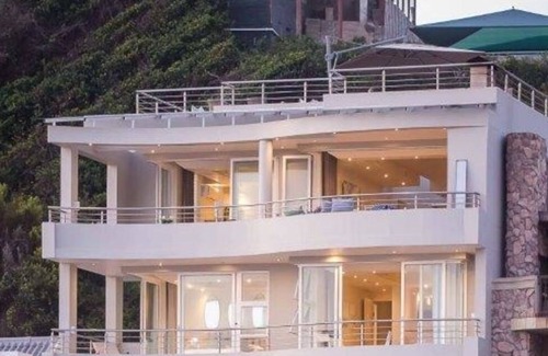 Herolds Bay House | Cozy Room with a partial sea view