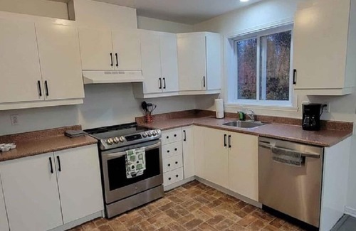 Chateauguay Condo | Cozy rooms in great condo townhouse!