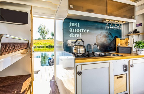 Ophoven Boat Rental | Cozy ship in Ophoven with lake view
