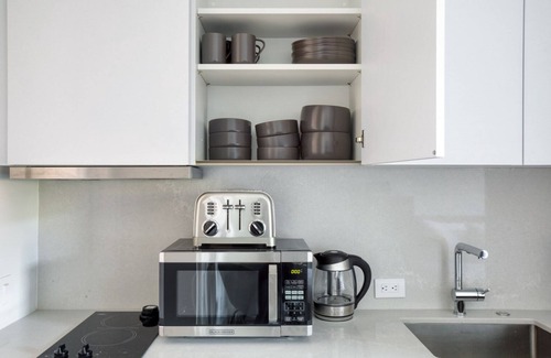 Columbus Apartment | Cozy South End Studio near T, Shops + Dining, by Blueground