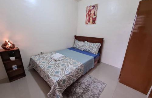 Pallocan Apartment | Cozy Space Near SM with Netflix and Fiber WiFi