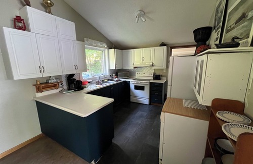 Novar House | Cozy, spacious lakeside home, less than 15 minutes to town.